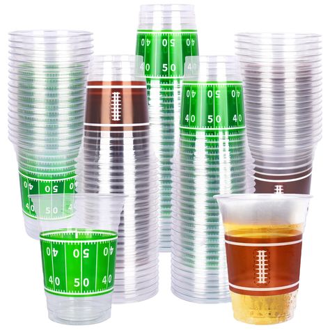 PRICES MAY VARY. Package Includes: Featuring 100 pieces of football-themed plastic cups, each offering an impressive capacity of 16 ounces. This designed set can amp up your football tailgate parties instantly. Football Design: Drawing inspiration from the football field, we've seamlessly incorporated yard numbers and football patterns into our cup's design. Ensure a game-friendly atmosphere around your drink table during every football party. High Utility: Our cups have a capacity of 16 oz and Kids Party Cups, Football Tailgate Party, Superbowl Party Decorations, Football Balloons, Football Party Supplies, Football Party Decorations, Football Parties, Football Cups, Football Theme Party