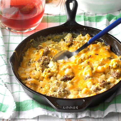 Sausage, Egg and Cheddar Farmer's Breakfast Recipe | Taste of Home Sausage And Egg Recipes, Farmers Breakfast, Sausage And Eggs, Breakfast Skillet, Queso Cheddar, Ground Sausage, Sausage And Egg, Hash Browns, Buffalo Chicken Dip