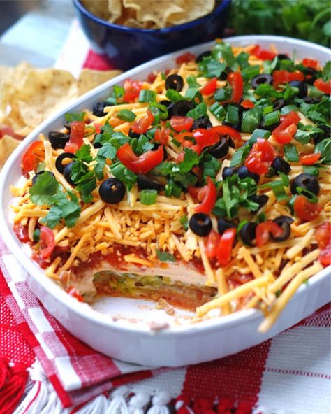 Classic Mexican 7 Layer Dip - southern discourse Mexican 7 Layer Dip, Appetizers Mexican, Greek Dip Recipes, Layered Dip Cups, Mexican Bean Dip, 7 Layer Bean Dip, 7 Layer Dip Recipe, Mexican Layer Dip, Mexican Dip