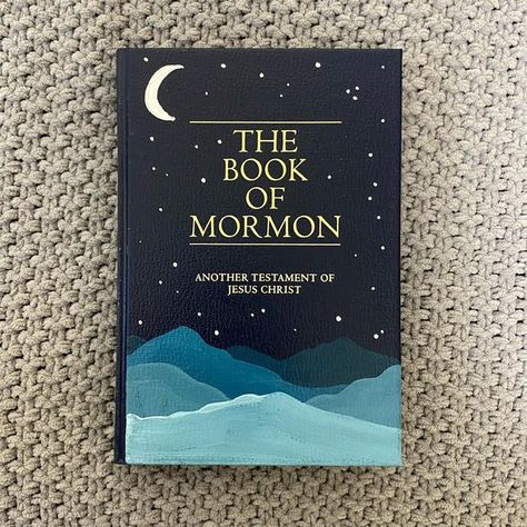 Hand Painted Book Of Mormon Cover, Decorate Book Of Mormon, Easy Book Of Mormon Painted Cover, Book Of Morning Painting, Paint A Book Of Mormon, Cute Book Of Mormon Paintings, Painting Books Of Mormon, Painted Scripture Cover, Painted Book Of Mormon Cover Ideas Easy