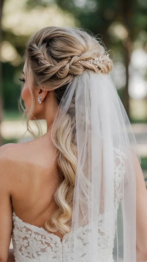 From Buns to Beach Waves: 15 Fabulous Wedding Hairstyles with Veils - pulsepathlife.com Hair Pieces For Wedding Hijab, Wedding Hairstyles Down With Tiara, Wedding Hair Half Down With Veil, Veil Updo Hairstyles Brides, Hair For Wedding Bride With Veil, Fingertip Veil Hairstyles, Bridal Hair With Tiara And Veil Half Up, Bridal Long Hairstyles With Veil, Vintage Bridal Hair With Veil