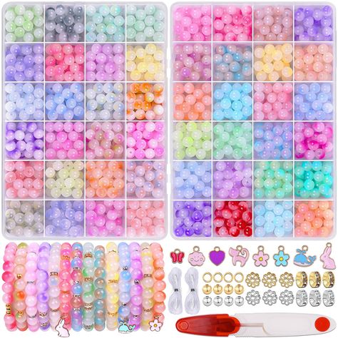 PRICES MAY VARY. 🎃Great Value Set: Wuollgess 8 mm beads for bracelets include more than 1200 pieces of 8mm glass beads with holes in 48 vivid colors,25 bracelet beads per color,190 pcs gold spacer beads, 190 pcs silver spacer beads, 8pcs charm pendants, 2pcs crystal elastic strings and scissors, enough quantity to meet your various needs of jewelry making or DIY craft. 🎄48 Colors Gradient Glass Bead Kit: This bracelet making kit glass beads includes 48 different colors 8 mm beads which can be Crystal Jewelry Making Kit, Crystal Bracelet Making Kit, Bracelet Making Kit Beads, Bead Kits Jewelry Making, Glass Beads Bracelet Ideas, Small Business Ideas Products, Melted Pony Beads, Nail Embellishments, Colors Gradient