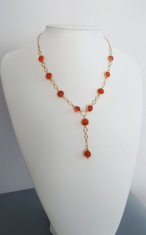 Chain link necklace with natural carnelian beads. Y necklace: 2" drop chain attached to 18" rosary necklace. 18K gold plated chain, high quality findings. CARNELIAN protects against envy, calms anger, and banishes emotional negativity Carnelian Aesthetic, Aesthetic Necklace, Carnelian Jewelry, Carnelian Necklace, Y Necklace, Rosary Necklace, Carnelian Beads, Chain Choker, Gold Plated Chains