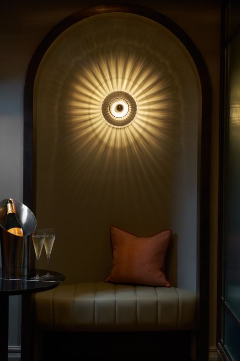 The New Wave Optic Wall Light fits perfectly in the alcove of the bar area at The Mayfair Townhouse - the beautiful starburst effect created by the light dominates the alcove and fills it with a flood of light creating a unique space. Alcove Lighting, Brooklyn Apartment, The New Wave, School Furniture, Bar Areas, Wedding Guest Dress Summer, Lighting Ideas, Unique Spaces, Light Effect