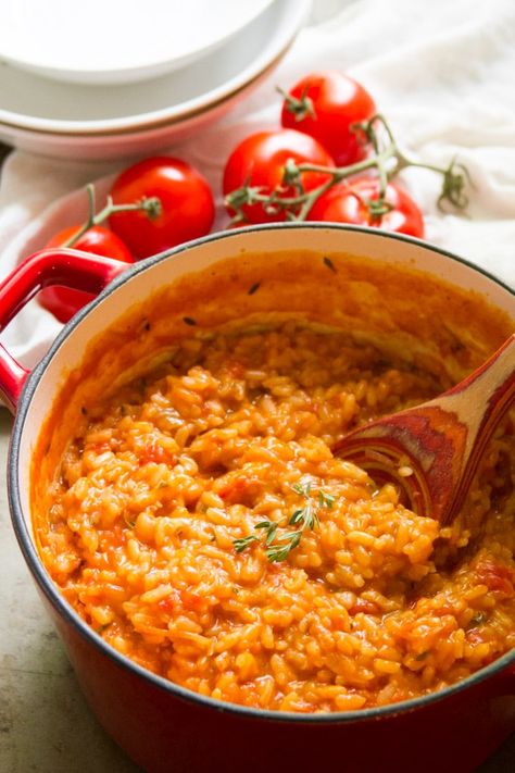 This creamy vegan tomato risotto is bursting with sweet and savory flavors from juicy roasted tomatoes, caramelized onions and a touch of thyme! #vegan #veganfood #veganrecipes #vegetarian #vegetarianrecipes #meatlessmonday #tomatoes #rice Onion Risotto, Tomato Risotto, Risotto Rice, Arborio Rice, Easy One Pot Meals, Caramelized Onion, Risotto Recipes, Tomato Recipes, Roasted Tomatoes