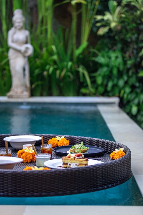 floating breakfast in bali, floating breakfast ubud, where to get a floating breakfast, dedary kriyamaha ubud floating breakfast Floating Breakfast In Bali, Breakfast In Bali, Black Dining Table Set, Floating Breakfast, Breakfast Hotel, Hotel Ads, Breakfast Photography, Pool Poses, Resort Lifestyle