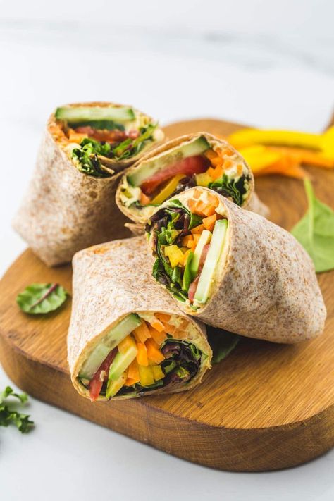 Do you not have enough time to prepare a full meal for your lunch? Then do not fret because lunch wraps are easy to make yet filling to the tummy! With that said, here are 15 healthy and delicious lunch wraps you will love. #lunchwraps #healthyrecipes #lunchrecipes Wrap Recipes For Lunch, Healthy Lunch Wraps, Wraps For Lunch, Panini Recipes Chicken, Vegetarian Wraps, Wraps Recipes Healthy, Hummus Wrap, Boiled Chicken Breast, Resep Salad