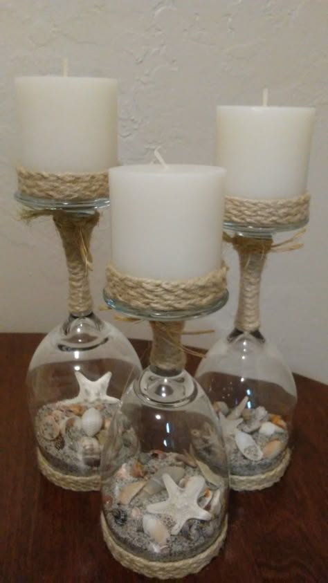 Etsy $30. Wine glass candle holders with sand and shells by prettybeachything. Wine Glass Candles, Wine Glass Candle Holder Diy, Glass Candle Centerpieces, Wine Glass Beach Decor, Creative Candle Holders, Shells And Sand In A Jar Glass Bottles, Wine Bottle Crafts Christmas, Wine Glass Candle Holder, Wine Glass Candle