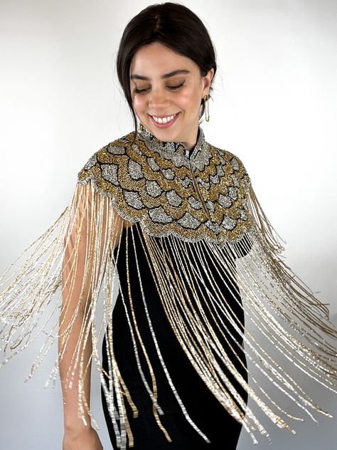 Gold silver beaded cape. Hands of harlow beaded cape. Fringe Cape Outfit, Fringe Cape, Cape Outfit, Beaded Cape, Fancy Blouse, Bead Embroidery Patterns, Fancy Blouses, Fancy Blouse Designs, Fort Worth Texas