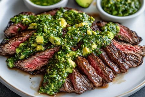 Introduction Skirt Steak with Avocado Chimichurri is a flavorful and vibrant dish that pairs the rich, juicy skirt steak with a fresh and creamy avocado chimichurri sauce. The chimichurri sauce, ... Learn more Chimichuri Recipe, Cheesecake Chimichangas Recipe, Avocado Chimichurri, Flat Iron Steak, Sliced Steak, Beet Recipes, Chimichurri Sauce, Fresh Salsa, Skirt Steak