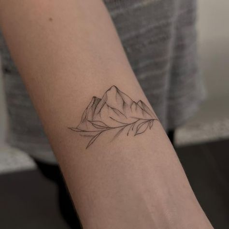 Alena 🤍 Tattoo artist in Prague (@tattoovaa) Delicate Mountain Tattoos For Women, Subtle Mountain Tattoo, Shaded Mountain Tattoo, Mountains With Flowers Tattoo, Valley Tattoo Mountain, Floral Mountain Tattoo, Mountain Tattoo With Flowers, Prague Tattoo Ideas, Mountain Fine Line Tattoo