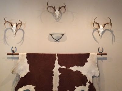 The Stylish Garden: How to Hang a Cowhide Rug Cow Hide Rug Hanging On Wall, Hanging Cowhide On Wall, How To Hang A Cowhide On The Wall, Cowhide Rug On Wall, Cow Hide Wall Decor Ideas, Cowhide On Wall Ideas, Rug On Wall, Cowhide Projects, Cowhide Rug Decor