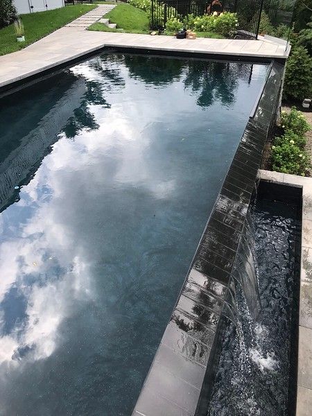 LIVINGSTON - Ultra Modern Infinity Edge Resort - brianstratton Pool Infinity Edge, Pool Retaining Wall, Indoor Pond, Austin House, Edge Pool, Outdoor Fireplace Designs, Luxury Swimming Pools, Custom Swimming Pool, Pool Contractors