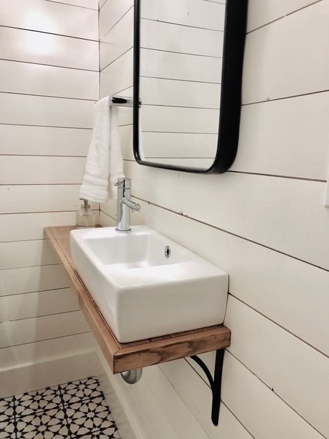 Small powder room with shiplap walls, cement floor tiles, wall mounted sink with custom wood sink shelf. Small Powder Room Sink, Tiny Powder Rooms, Cement Floor Tiles, Tiny Powder Room, Small Powder Room, Powder Room Sink, Shiplap Walls, Small Toilet Room, Small Bathroom Sinks