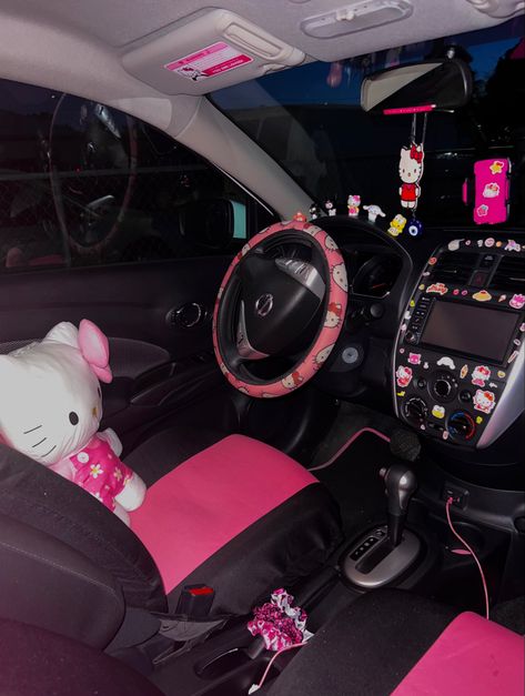 Hello kitty Hello Kitty Car Interior Aesthetic, Hello Kitty Car Inside, Car Theme Ideas Interior, Hello Kitty Car Decorations, Car Decorations Interior Y2k, Hello Kitty Steering Wheel Cover, Car Decorations Interior Hello Kitty, Mcbling Car Interior, Kuromi Car Interior