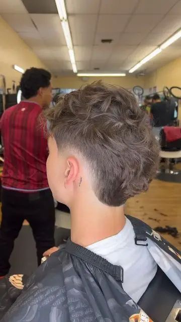 30 Low Burst Fade Haircuts for the Urbane Man Burstfade Haircut Men, Low Taper Burst Fade, Burst Fade Wavy Hair, Low Burst Fade Curly Hair, Burst Haircut, Burst Fade Short Hair, Burst Fade Taper, Mid Burst Fade, Burst Fade Curly Hair