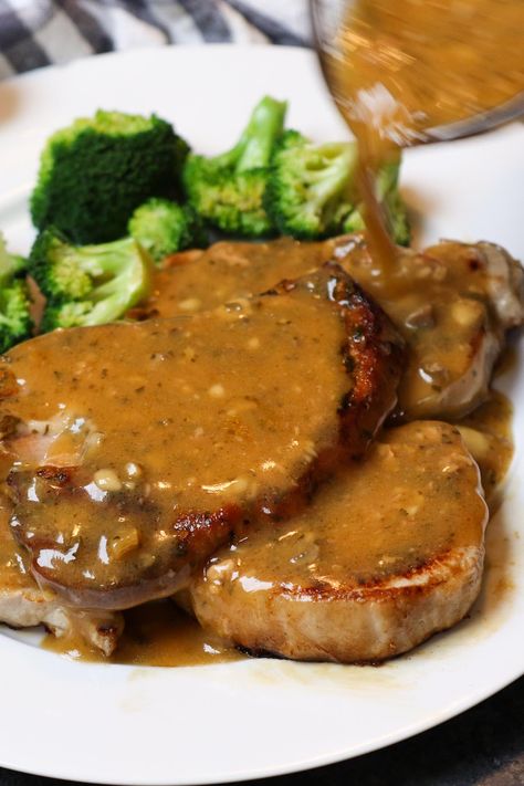 Drizzling gravy from the slow cooker onto crock pot ranch pork chops Boneless Pork Chops Crock Pot, Pork Loin Chops Recipes, Slow Cooker Pork Chops Recipes, Ranch Pork Chops Crock Pot, Boneless Pork Chop Recipes, Pork Chop Recipes Crockpot, Ranch Pork Chops, Pork Crockpot Recipes, Pork Chops And Gravy