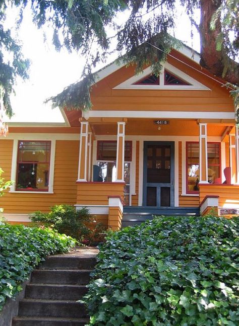 Lighter orange exterior, white/cream trim,  blue door and porch, red/dark orange details Creative Exterior House Painting Ideas, 1970s House Exterior, Cute Small Houses, Bright House, Seattle Homes, Farm Houses, Yellow House, Exterior Paint Color, Orange House