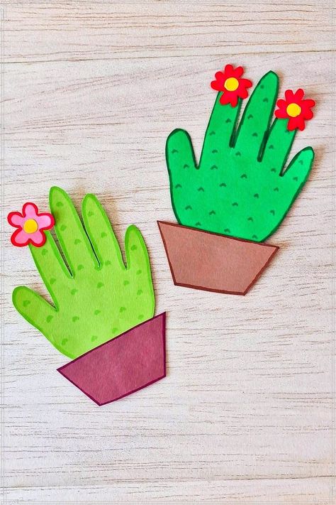 Celebrate Valentine's Day with a heartfelt handprint cactus craft for kids! This easy DIY project allows children to create unique cactus art from their handprints, making it a perfect Valentine's card or a decorative piece for a bulletin board. Ideal for preschool art activities, this craft blends fun and creativity, resulting in a special gift for parents or friends. Nobody Hugs A Cactus Craft, Cactus Crafts For Kids, Popsicle Sticks Halloween Crafts, Pastel Spring Nails, Cactus Crafts, Cactus Craft, Nails Pastel, Diy Summer Crafts, Valentine Crafts For Kids