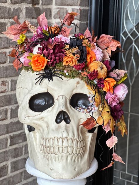 Transform your space into a hauntingly beautiful setting with our Extra-Large Halloween Floral Skull Decor. This striking piece combines the eerie allure of a skull with the timeless beauty of flowers, making it the perfect centerpiece for your Halloween festivities or a year-round statement piece for gothic or eclectic interiors. Why You'll Love It This Extra-Large Halloween Floral Skull Decor blends the macabre with the beautiful, creating a piece that's as intriguing as it is decorative. Its Skull Decor Halloween, Whimsical Halloween Decor, Skull Centerpiece, Flower Diy Paper, Witchy Party, Festive Halloween Decor, Paper Flower Diy, Tissue Paper Flowers Diy, Skull Crafts