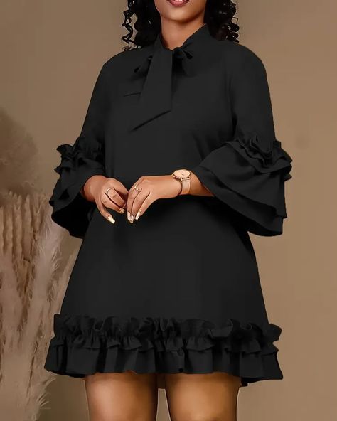 Plus Size Tie Neck Dress, Ruffle Trim 3/4 Sleeve Lettuce Hem Dress. ❌SOLD❌ ✅Size: 1XL DM to Place Orders📨 Nationwide 🚚 Available …………………………………………………………………………… ✨Bust 42.2-44.5” Waist 36.2-38.6” Hip 46.1-48.5”✨ Fabric has slight stretch ……………………………………………………………………………… #fashionstyle #elegantdresses #blackdress #dinnerdress #available #shopnow #chicandboujie #growth #instashop #sales #eveningwear #chic #boujie #boutique @key1of3 @chic_and_boujie #onlinestore #shoponline Trendy Lace Top, Short Dresses Classy, Simple Dress Styles, Vacation Birthday, Cute Professional Outfits, Classy Short Dresses, Corporate Dress, Chic Dress Classy, Simple Gowns