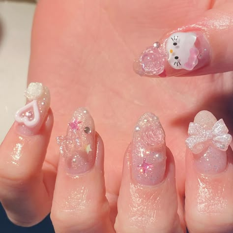 Pretty Pink Hello kitty nails 🎀✨ Love working with all my glitter gels to create these beautiful sets!! All the different sparkles show up amazing in person 😭😭 Also!! @bubblyteabunny ‘s natural nails are always 🙌🏻🙌🏻 on point! #nails #gelnails #nailart #hellokitty #hellokittycore #hellokittynails #glitternails Hello Kitty Short Nails With Charms, Pink Sanrio Nails, Hello Kitty Gel Nails, Pink Nails Hello Kitty, Nail Ideas Hello Kitty, Hello Kitty Charm Nails, Nail Designs Hello Kitty, Short Hello Kitty Nails, Hello Kitty Inspired Nails