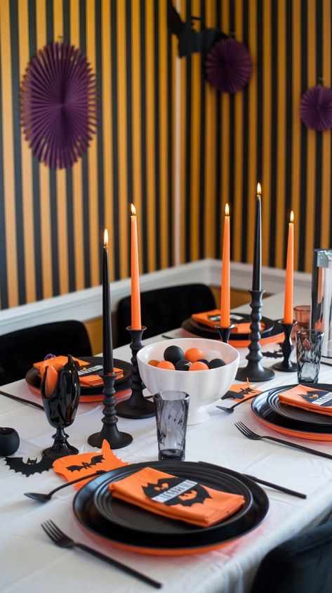 Set the perfect table for your Halloween dinner with these creative table settings. From eerie candlelight to pumpkin centerpieces, make your gathering extra special with a mix of spooky and cozy. Don't forget the Halloween-themed plates, napkins, and utensils for a complete look. #HalloweenTable #FallTablescape #SpookyDinner Creative Table Settings, Spooky Dinner, Halloween Table Settings, Creative Table, Creative Tables, Halloween Decor Ideas, Halloween Dinner, Pumpkin Centerpieces, Fall Tablescapes