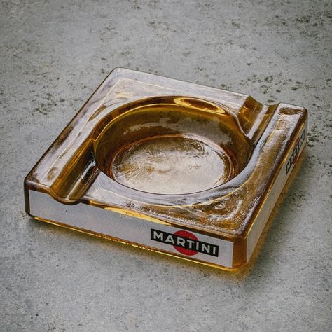 VINTAGE MARTINI ASHTRAY Rare vintage ashtray by Italian brand Martini. Beautiful piece for every smoker, interior and vintage lover. Available via link in bio 🔗 WHITE ORCHARD COLLECTIBLES #gifts #custom #antiques #goodvibesonly #resinashtray #highend #thrifted #retrodecor #concretedecor #highendcollectibles #greytcrete #outdoorashtray #giftforsmokers #vintage #vintagecollectible #vintagecollectibles #tobacciana #ashtraycollection #vintageforsale #puffpuffpass #smokingaccessories #vintage... Skatepark Ashtray, Vintage Martini, Designer Ashtray, Outdoor Ashtray, Antique Ashtrays, Vintage Ashtrays, Ashtray Vintage, Vintage Ashtray, Puff And Pass