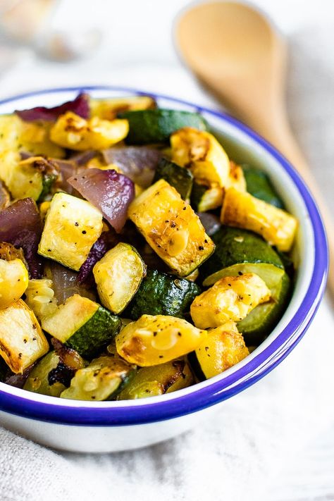 An easy summer side, this roasted summer squash and zucchini recipe is healthy, easy and so flavorful. Vegan and gluten-free. #roastedzucchini #roastedsquash #summersquash #eatingbirdfood #roastedvegetables Zucchini And Red Onion Recipes, Roasted Zucchini And Squash, Zucchini Zoodles, Roasted Summer Squash, Tasty Vegetables, Squash And Zucchini, Easy Summer Side Dishes, Summer Squash Recipes, Yellow Squash Recipes