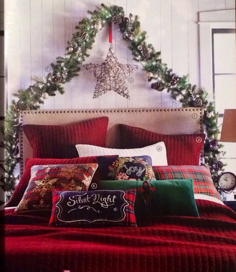 Christmas in the bedroom...pretty garland above bed with star!!! (Pier One Imports Christmas catalog 2015) Above Bed Christmas Decor, Garland Over Bed, Xmas Bed, Garland Above Bed, Xmas Bedroom, Twinkling String Lights, Christmas Bedrooms, Holiday Bedding, Pier One Imports