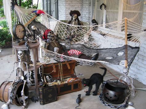 Pirate in hammock porch decorations Pirate Porch Decor, Shipwreck Halloween, Hammock Porch, Ocean Halloween, Pirate Decorations, Pirate Halloween Decorations, Pirate Halloween Party, Halloween Lawn, Pirate Decor