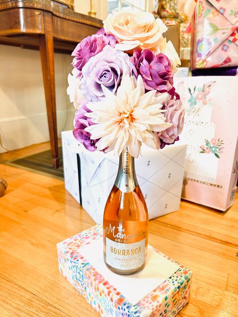 Wine Bottle Centerpieces For 50th Birthday Party, Wine With Flowers On Top, Champagne Bottle Flower Arrangements, Wine Bottle With Flowers On Top, Wine And Flowers Gift Boxes, Homemade Champagne, Champagne Centerpiece, Champaign Bottle, Flowers And Wine