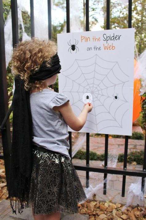 Pin the Spider on the Web Game | CatchMyparty.com Spider Web Walking Game, Halloween Pin The Spider On The Web, Pin Spider On Web Game, Prek Halloween Party Games, Spider Web Toss Game, Eyeball Toss Halloween Game, Toddler Halloween Games Activities, Halloween Outside Activities For Kids, Pin The Halloween Game