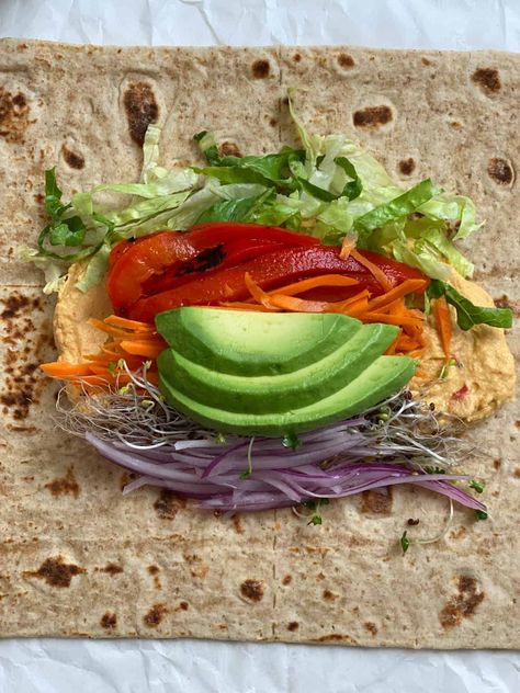 This Easy Hummus Tortilla Wrap is the best! They're simple to make and also great on the go as well. Tasty, easy, and simple to whip up for a go-to meal! #plantbasedonabudget #roasted #red #pepper Hummus Tortilla Wrap, Cold Lunch Wrap Ideas, Veggie Wrap Ideas, Vegetarian Wrap Ideas, Wrap Aesthetic Food, Vegetarian Tortilla Wrap, Folded Tortilla Wrap, Wrap Ideas For Lunch, Wraps Aesthetic