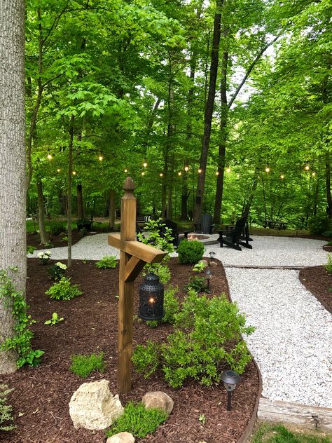 Fire Pit Ideas Side Yard, Campsite Garden Ideas, Gravel Hillside Landscaping, Landscaping Around A Fire Pit Area, Backyard Wooded Area Ideas, House In Woods Landscaping, Woodsy Backyard Landscape, House In The Woods Landscaping, Camp Landscaping Ideas