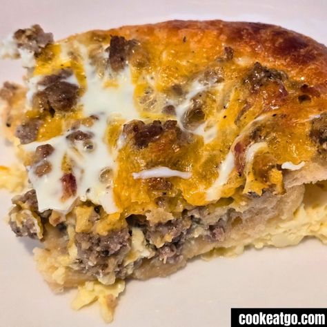 Looking for an easy but filling breakfast casserole!! Baked on fluffy crescent rolls and topped with bacon, sausage, cheese, and eggs, makes for an easy breakfast! It will be a crowd-pleaser and a family favorite as well. Comfort food for breakfast is perfect! Pin this to your Breakfast Pinterest board for later. Easy Sausage Breakfast Casserole, Bacon Egg Bake, Using Crescent Rolls, Easy Breakfast Casserole Sausage, Sausage Crescent Rolls, Food For Breakfast, Sausage Breakfast Casserole, Easy Breakfast Casserole, Breakfast Casserole Bacon