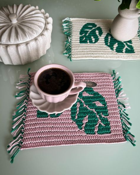 Monstera Leaves Coaster - a mosaic crochet pattern. 💛😁 It’s perfect for spring/summer table top decor. 💚💚💚 Pattern in all my shops via link in bio. ☝️ Create beauty one stitch at a time! 💚 #crochet #crochetpattern #crochetpatterns #mosaiccrochet #mosaiccrochetpattern #crochethome #crochethomedecor #crochetcoaster #crochetcoasters #crochetersofinstagram #crocheter #crocheting #makersofinstagram #yarncraft #yarncrafts #yarnlove #hobbyistontheroad #etsy #ravelry #ravelrypattern #ribblr Funky Table, Mosaic Crochet, Crochet Towel, Summer Table, Top Decor, Monstera Leaves, Crochet Home Decor, Summer Tables, Crochet Coasters