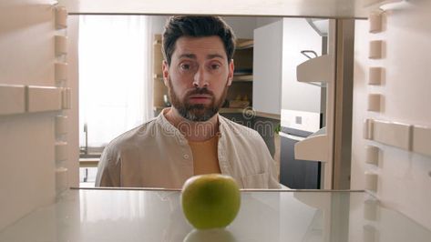 POV point of view from inside refrigerator Caucasian adult man at kitchen open empty fridge with one green apple fruit stock photography Fridge Photography, Empty Refrigerator, Inside Refrigerator, Fruit Advertisement, Empty Fridge, Hungry Man, Kitchen Open, Lettuce Leaves, Apple Fruit