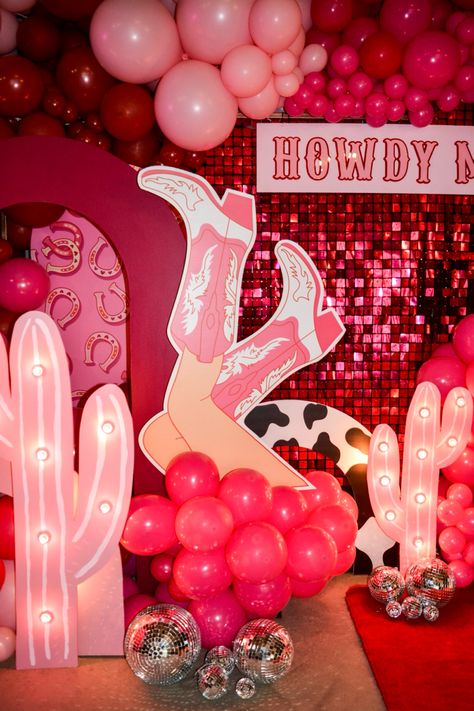 Howdy 18th birthday party, Cowgirls and disco balls. Lets go girls! Light up cactus in a light pink with the light up 18 and custom signage Howdy Maddy. Cowgirl Pink Party Ideas, Cowboy Pink Party, Disco Cowgirl Birthday Party One, 40th Birthday Cowgirl Theme, Glam Cowboy Party, Pink Western 21st Birthday Party, 18th Cowgirl Party, Cowboy Disco Birthday Party, Disco Cowgirl Bday Party