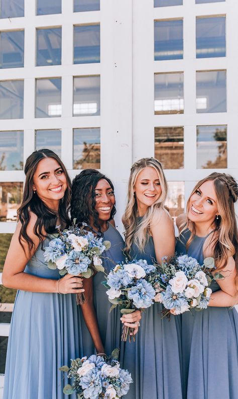 dusty blue bridesmaid dresses and bouquets | Dresses are from Boda Bridal, Bridesmaid bouquets are from Gracefully Bloomed, Hair/Makeup is from Brides & Braids, bridesmaid earrings and tennis bracelets are from Diamonds Direct | Bridesmaids: @lornabalfour @mermaidmyra @kellyfellows_  | Photo: Julia Mather photography Dusty Blue Bridesmaid Dresses Long, Bridesmaid Dresses Blue Dusty, Bridesmaid Dusty Blue, Modern Blue Bridesmaid Dresses, Dusty Blue Wedding Bouquet Brides, Bridesmaids Blue Dresses, Steel Blue Bridesmaids, Dusty Blue Bridesmaid Bouquet, Cloudy Blue Bridesmaid Dresses