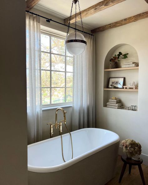 Small Master Bath Vanity, Bath Under Window, Amber Interiors Bathroom, Bathtub Shelf, Spanish Home Decor, Bathroom Window Treatments, Tub Ideas, Amber Lewis, Cottage Bathroom