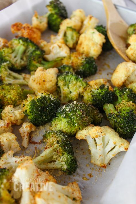 Easy and delicious oven roasted broccoli and cauliflower. A simple vegetable pairing for your next dinner. Brocoli And Cauliflower Recipes Healthy, Broccoli And Cauliflower In Oven, Best Roasted Broccoli And Cauliflower, Roasted Brocolli And Cauliflower Recipes, Roast Cauliflower And Broccoli, How To Cook Broccoli And Cauliflower, Broccoli And Coliflower Recipes Dishes, Easy Broccoli And Cauliflower Recipes, Oven Roasted Broccoli And Cauliflower