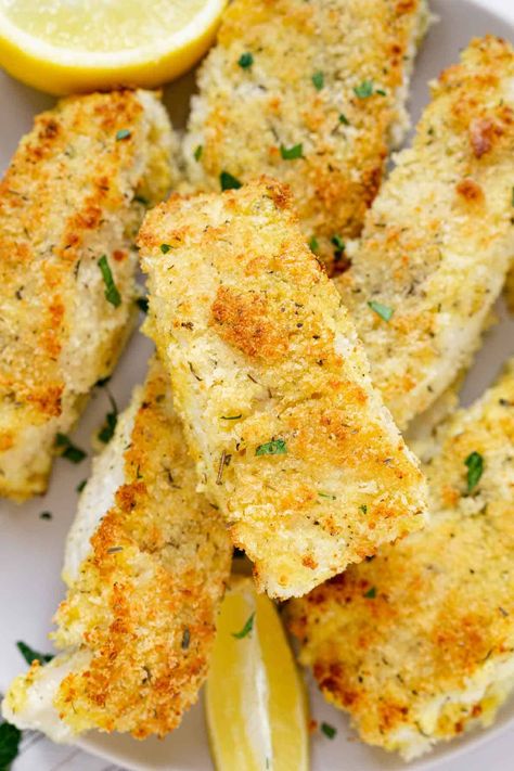 Crispy, delicious, and easy to make in under 30 minutes! This Parmesan Panko Breaded Cod is a favorite seafood dinner for the whole family. Learn the best way to cook cod fillets - by coating the fillets in a delicious panko breadcrumb mixture. This recipe has air fryer cod and oven baked cod instructions. Be sure to SAVE this easy cod recipe! How To Cook Cod Fillets In Oven, Breaded Cod Fish Recipes, Cod Fillets Recipes Baked, Oven Fried Cod Fish Recipes, Breaded Cod Recipes, Recipes For Cod Fillets, Air Fry Cod Fillets, Cod Recipes Air Fryer, Panko Crusted Cod Baked