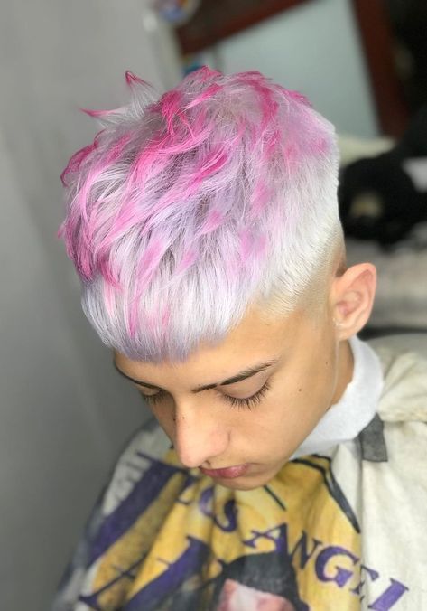 Hair highlights for men involve streaks or small portions of hair dyed a different color. Discover more pink haircuts for men. Mens Split Dye, Boy Hair Color, Pastel Pink Hair Men, Hair Color Man, Mens Hair Color, Men’s Colored Hair, Men Colored Hair, Colored Hair Men, Mens Hair Color Ideas