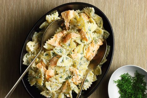 Simple but spectacular weeknight fare: seared salmon and bowtie pasta tossed in lemony ricotta and dill. Salmon Ricotta Pasta, Salmon Bowtie Pasta, Salmon And Ricotta Recipe, Mediterranean Salmon Pasta, Salmon Ricotta Recipes, Salmon Pasta Recipes Healthy, Salmon Ricotta, Ricotta Pasta Recipes, Salmon Pasta Recipes