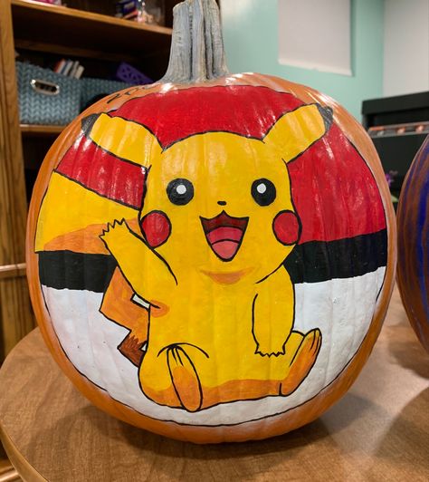 Pumkin Paintings Idea Cute Simple, Pokémon Painted Pumpkin, Pumkin Carving Bluey, Painted Pokemon Pumpkins, Pikachu Pumpkin Painting, Pumpkin Painting Ideas Pokemon, Pumpkin Painting Ideas Picachu, Pikachu Pumpkin, Pokemon Pumpkin Painting