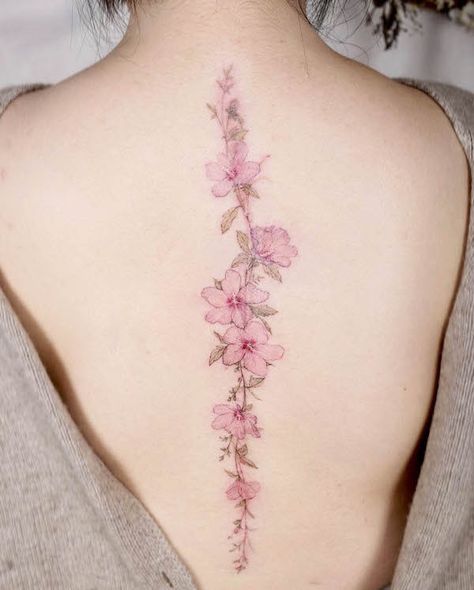 Cherry blossom spine tattoo by @tattooist_flower Back Tattoo Women Spine, Back Tattoos Spine, Floral Back Tattoos, Flower Spine Tattoos, Flower Tattoo Back, Tattoos For Women Flowers, Back Tattoos For Guys, Spine Tattoos For Women, Cherry Blossom Tattoo