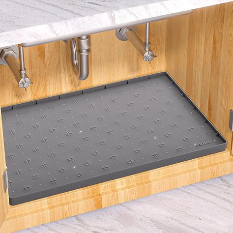 The Sdpeia Under Sink Mat Is 31% Off on Amazon! | The Kitchn Under Sink Mat, Kitchen Cabinet Liners, Cabinet Liner, Sink Tray, Kitchen Organizers, Sink Mats, Under Sink Organization, Environmental Sustainability, Mat Kitchen