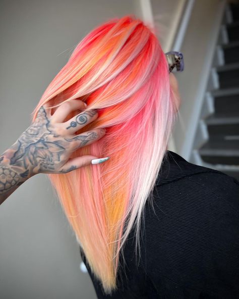 Image description: The back of a person's head, they have neon pink, orange, and yellow hair with white blonde pieces. Hot Pink And Pastel Pink Hair, Pink Halo Hair Blonde, Fun Hair Colors For Blondes, Blonde With Vivid Color, Bold Hair Color Ideas For Blondes, Hair Color Sectioning, Blonde Hair With Orange, Blonde Root Drag, Creative Color Hair