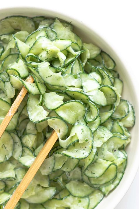 This refreshing Cucumber Yogurt Salad recipe features all the flavors of tzatziki in salad form. So if you love tzatziki, then you will love this creamy cucumber salad with all it's Greek and Mediterranean vibes. It’s loaded with crunchy cucumbers, creamy Greek yogurt, fresh dill, garlic and lemon. A quick and easy side dish that is SO GOOD! | www.mapleandmango.com Cucumber Yogurt Salad, Salad Caprese, Salad Coleslaw, Yogurt Salad, Salad Quinoa, Cucumber Yogurt, Resep Diet, Salad Pasta, Healthy Food Dishes